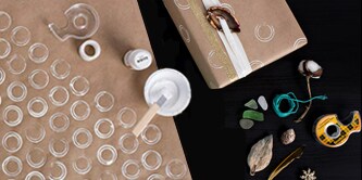 Designing wrapping paper using an empty roll of Scotch® Tape and some paint
