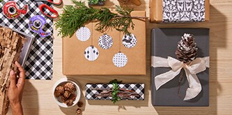  Creating present decorations from natural, green elements such as pinecones or holly
