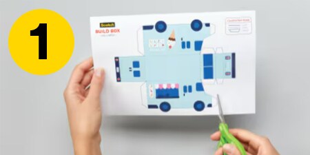 Step 1 - cutting out the automobile template from a piece of paper
