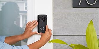Person using Scotch® FIX™ Double sided Mounting Tape
